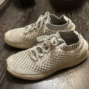 Grey No Bull tennis shoes.